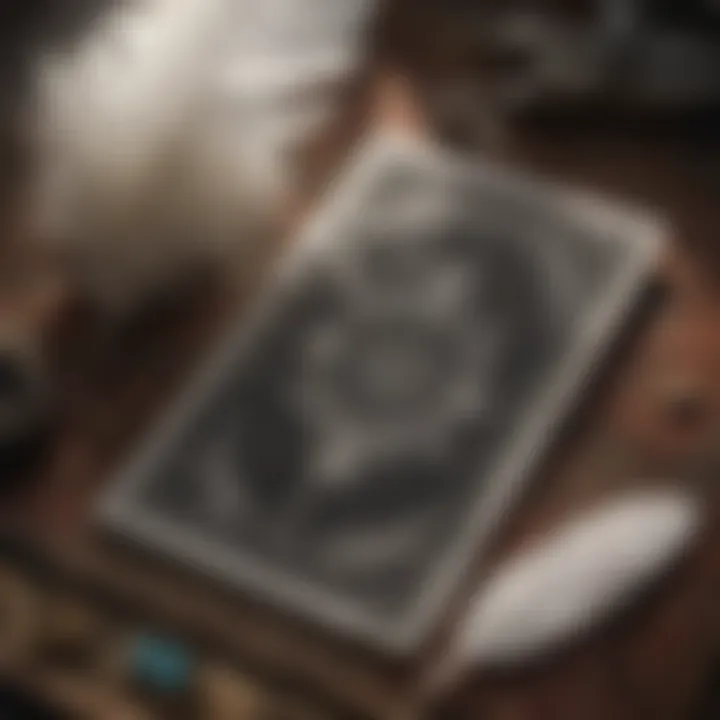 Symbolic white feather resting on tarot cards